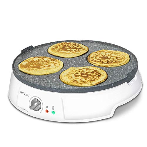 Make delicious crepes with the Cecotec 1200W Crepe Maker featuring a non-stick rockstone coating, adjustable thermostat, and reversible plate. Perfect for pancakes!